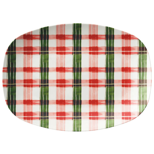 Plaid-patterned oval plate with pink, green, and white colors on a white background