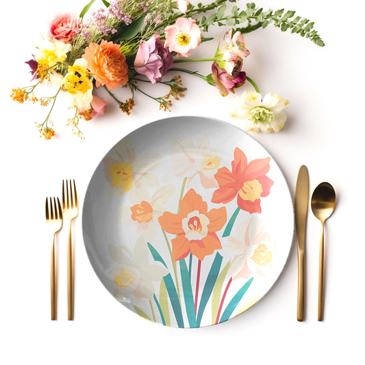 Floral narcissus plate with cutlery and flowers on a white background