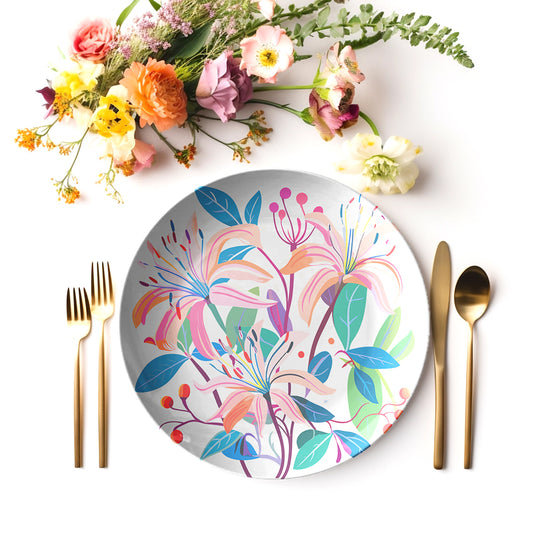 Colorful honeysuckle floral print plate with cutlery and flowers on a white background