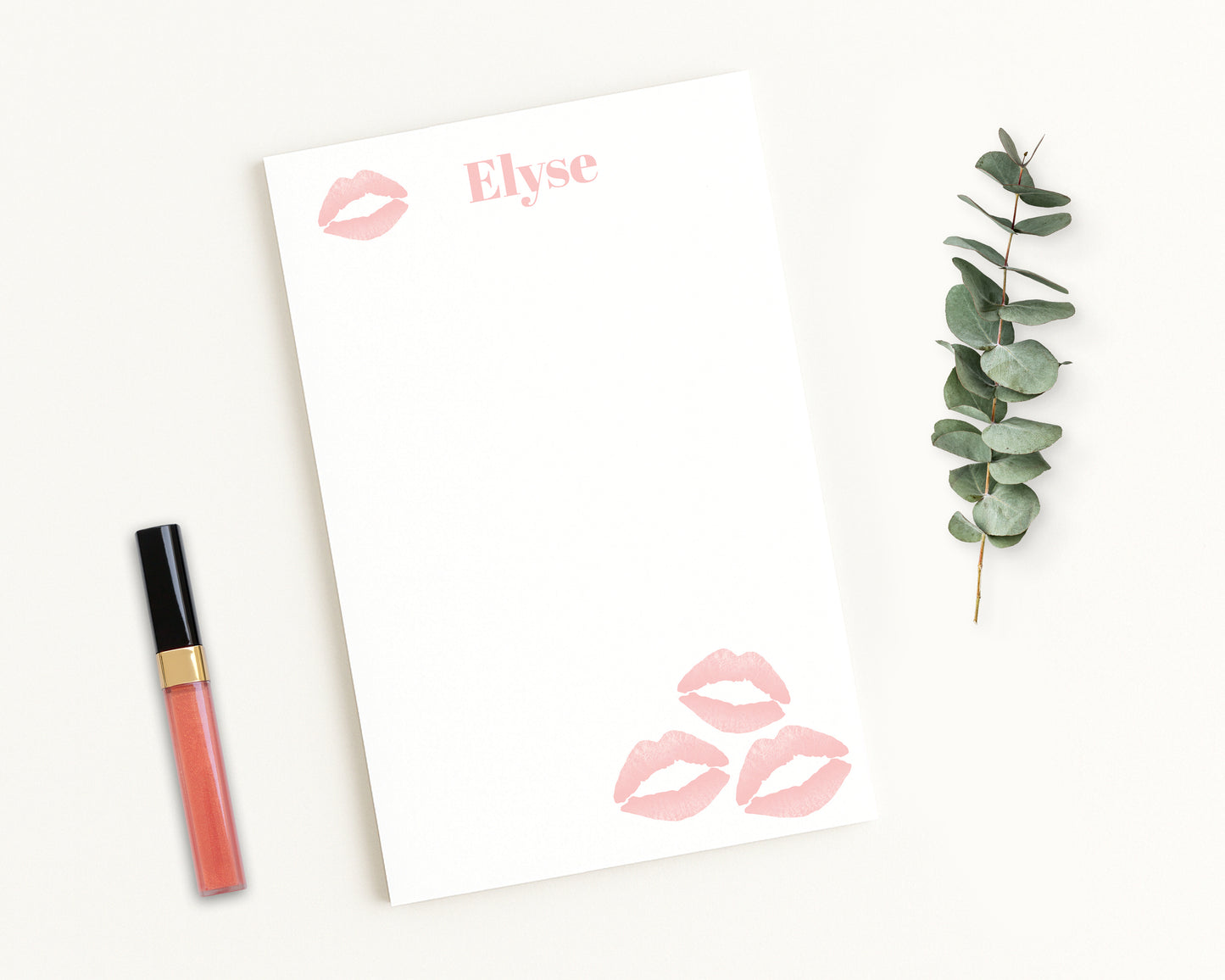 Personalized notepad stationery with flirty light pink lipstick kiss prints and custom name