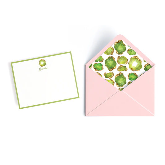 Luxury personalized notecard, white with green border and custom name, peridot birthstone jewel and pink envelope lined with gemstone collage print design.