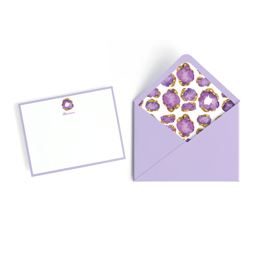Personalized note card with matching envelope featuring purple and gold geode gem design on a white background