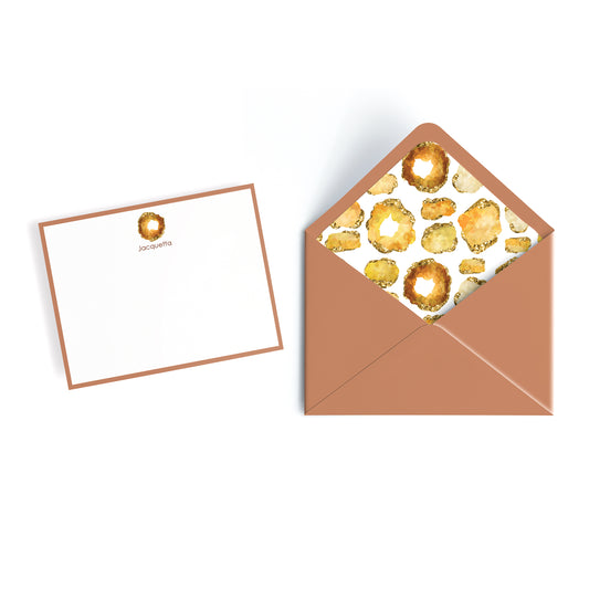 Custom stationary monogrammed with name initials and topaz gemstone print. Matching coordinating envelope is lined with a collage of topaz gem print.