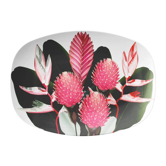 Modern serving platter with lush colorful pink tropical flowers