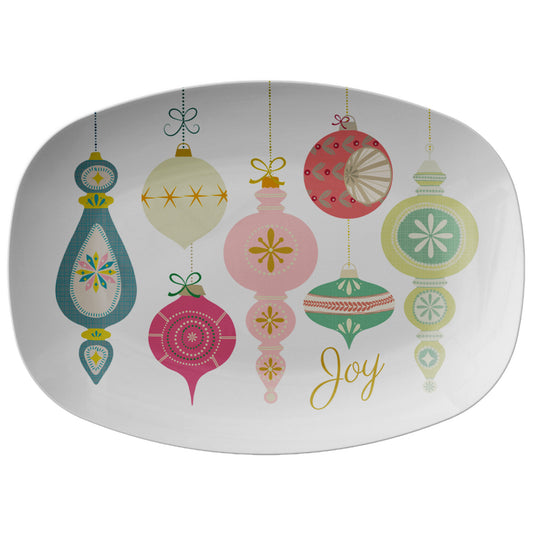 Glamorous and chic holiday platter featuring vintage Christmas ornaments and the word Joy.