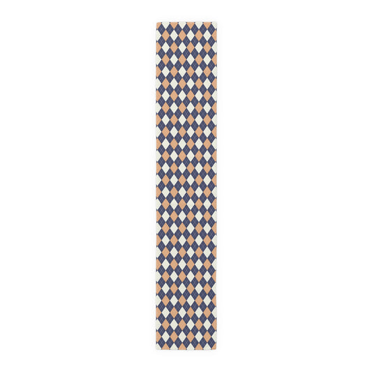 Argyle diamond pattern table runner in navy, orange and cream.