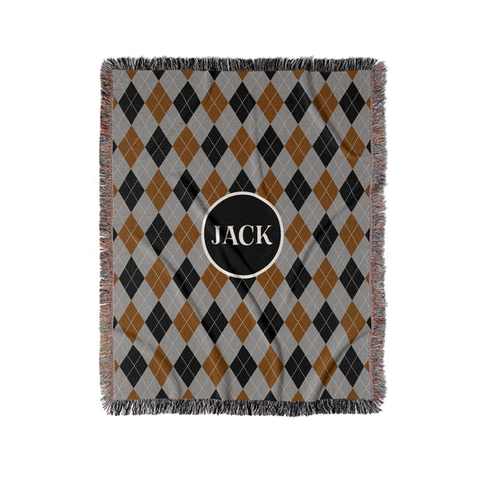 Argyle woven throw blanket in grey, black and rust. Personalized text with any name or word.