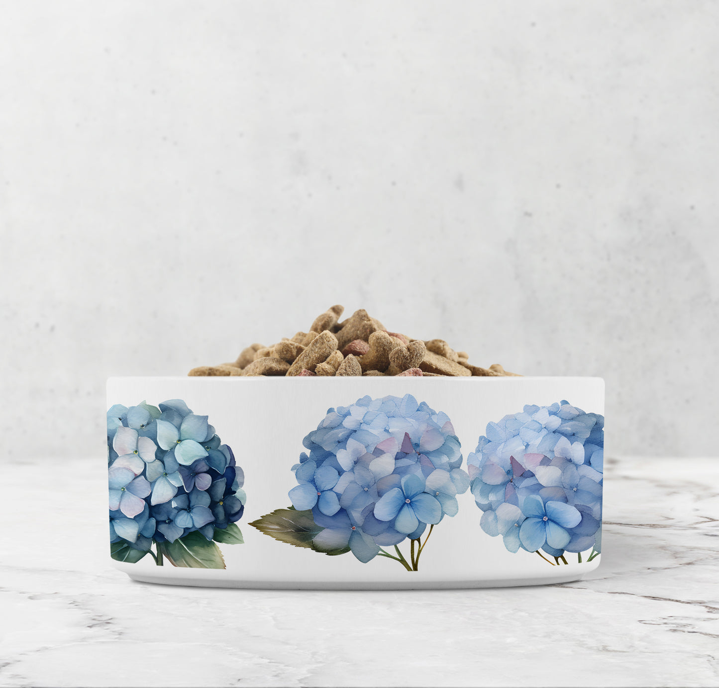 White pet bowl has blue and purple hydrangea flowers printed on it.