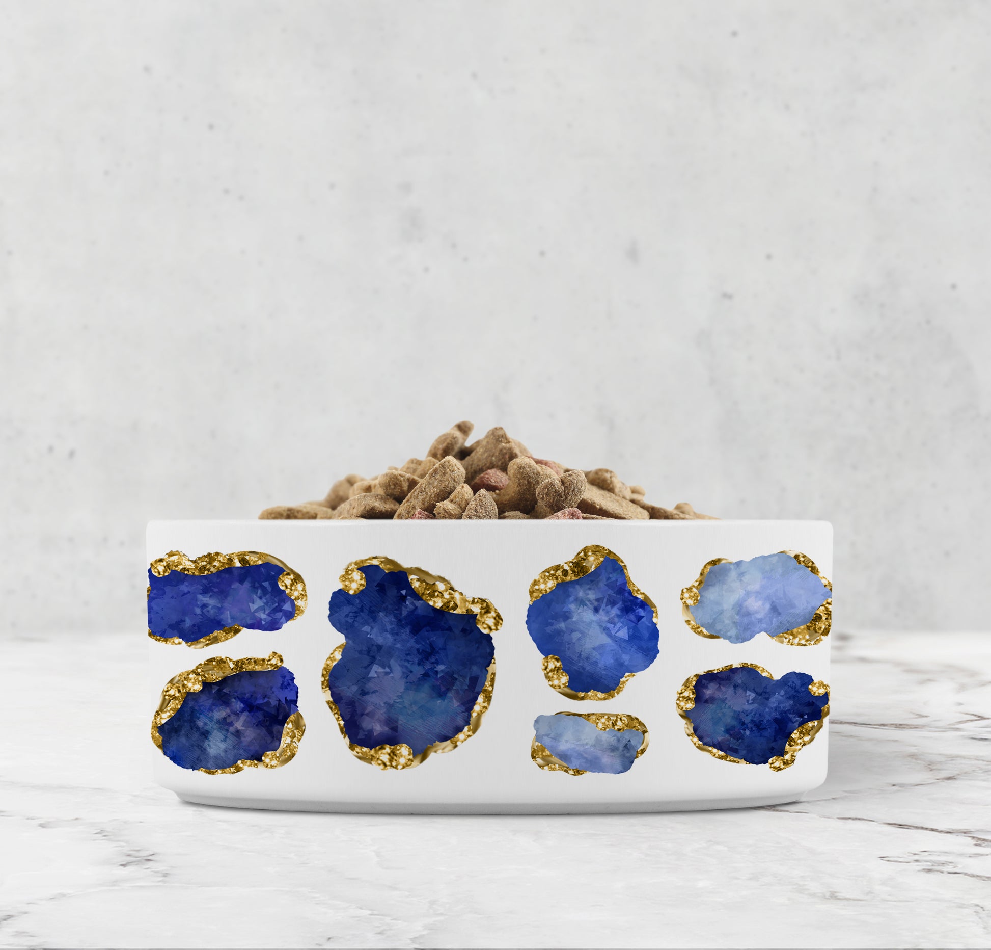 Blue and white ceramic dog bowl with sapphire jewels and god accents