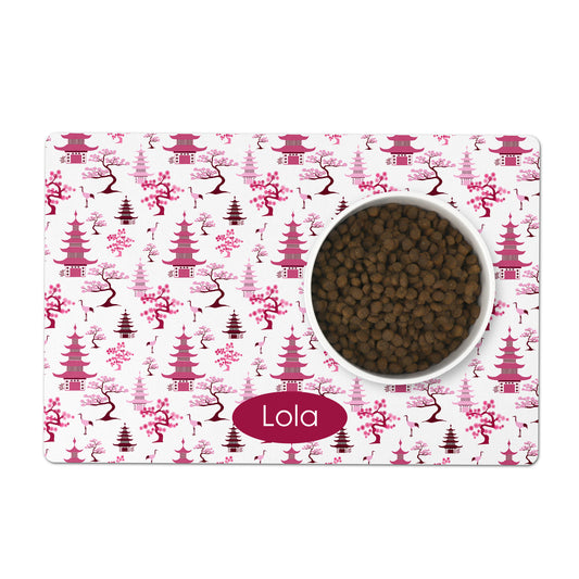 Personalized dog bowl mat in pink chinoiserie print.