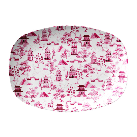 Pink chinoiserie toile pattern printed on white platter.