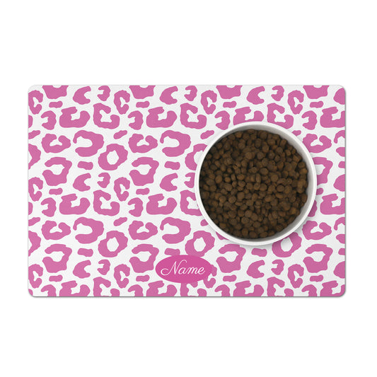 Custom dog bowl mat has a pretty pink leopard pattern.