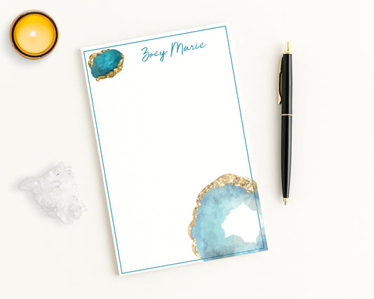 Personalized Notepad with geode jewel design and pen on a white background