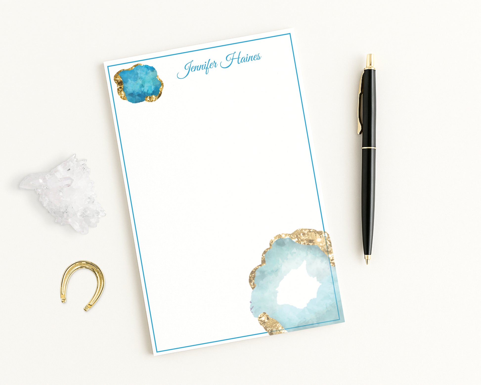 Aquamarine gemstones printed on white notepad personalized with any name.
