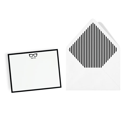 Chunky square black eyeglasses illustration stationery set personalized with custom name. Matching white envelope with black stripe liner.