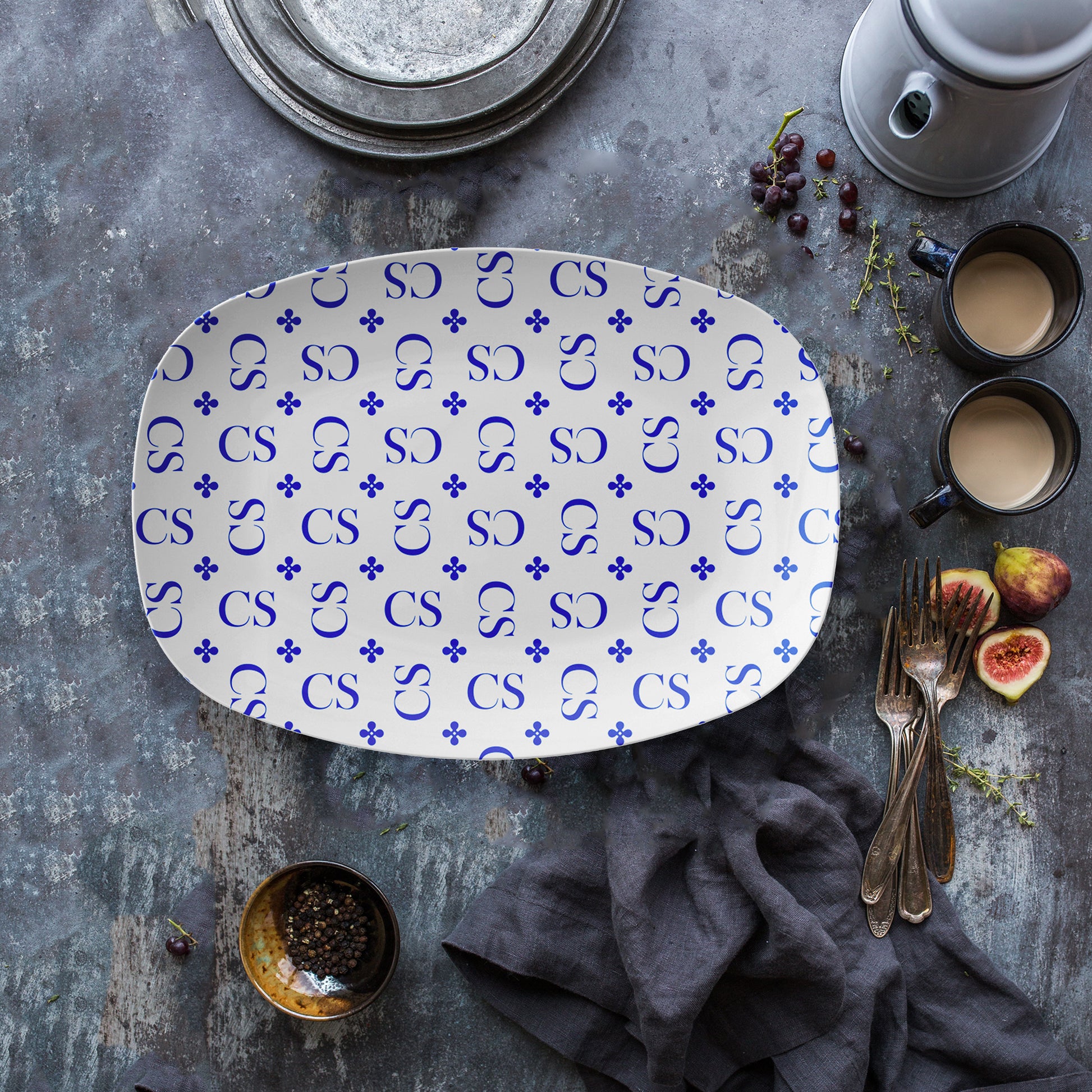 White and blue monogrammed serving platters and trays with custom all-over initials pattern