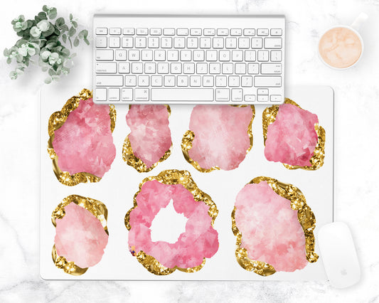 Gorgeous pink and gold gemstone pattern is printed on this  pretty desk pad. Also may be used as a counter or bar mat. Reverses to nonskid rubber back.