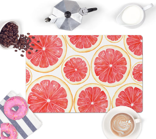 Colorful pink grapefruit slices are printed on this unique kitchen counter mat. Reverses to nonskid rubber back.