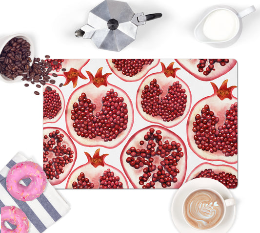 Colorful red and white pomegranate kitchen counter mat reverses to nonskid rubber back.