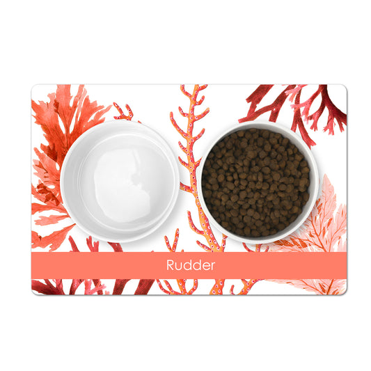 Personalized pet mat with ocean sea coral print in red orange and white.