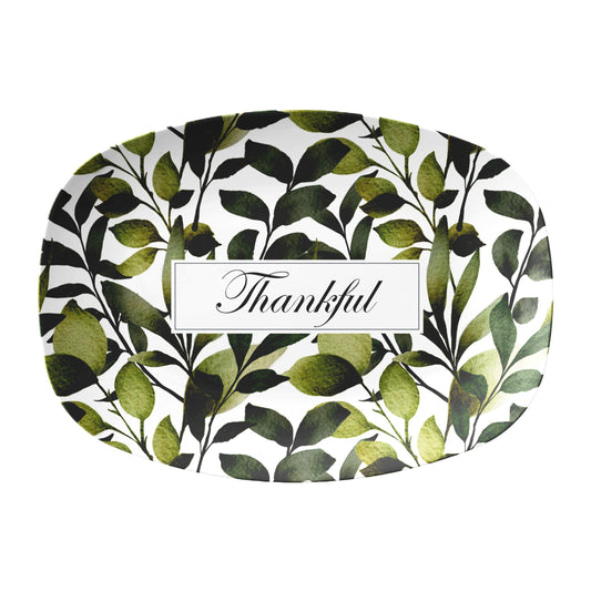 Decorative serving tray with green leaf pattern and 'Thankful' text on a white background