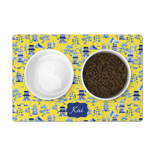 Chinoiserie pet bowl mat with custom name in yellow, blue and white