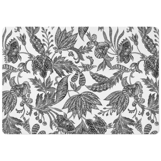 Pet food mat for dog food and cat food bowls. Black and white floral batik print.