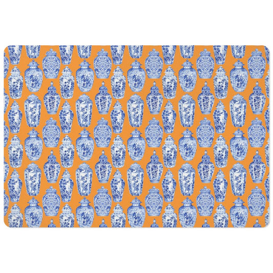 Pet feeding mat with blue and white ginger jars chinoiserie print on orange.