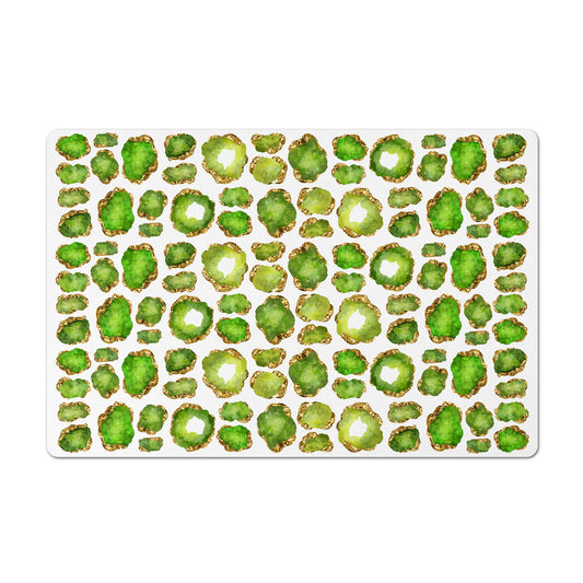 Mat for pet food with peridot jewel print for pet bowls.