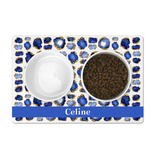 Custom name pet dish mat has beautiful blue sapphire and gold gemstones. Add any name or word.