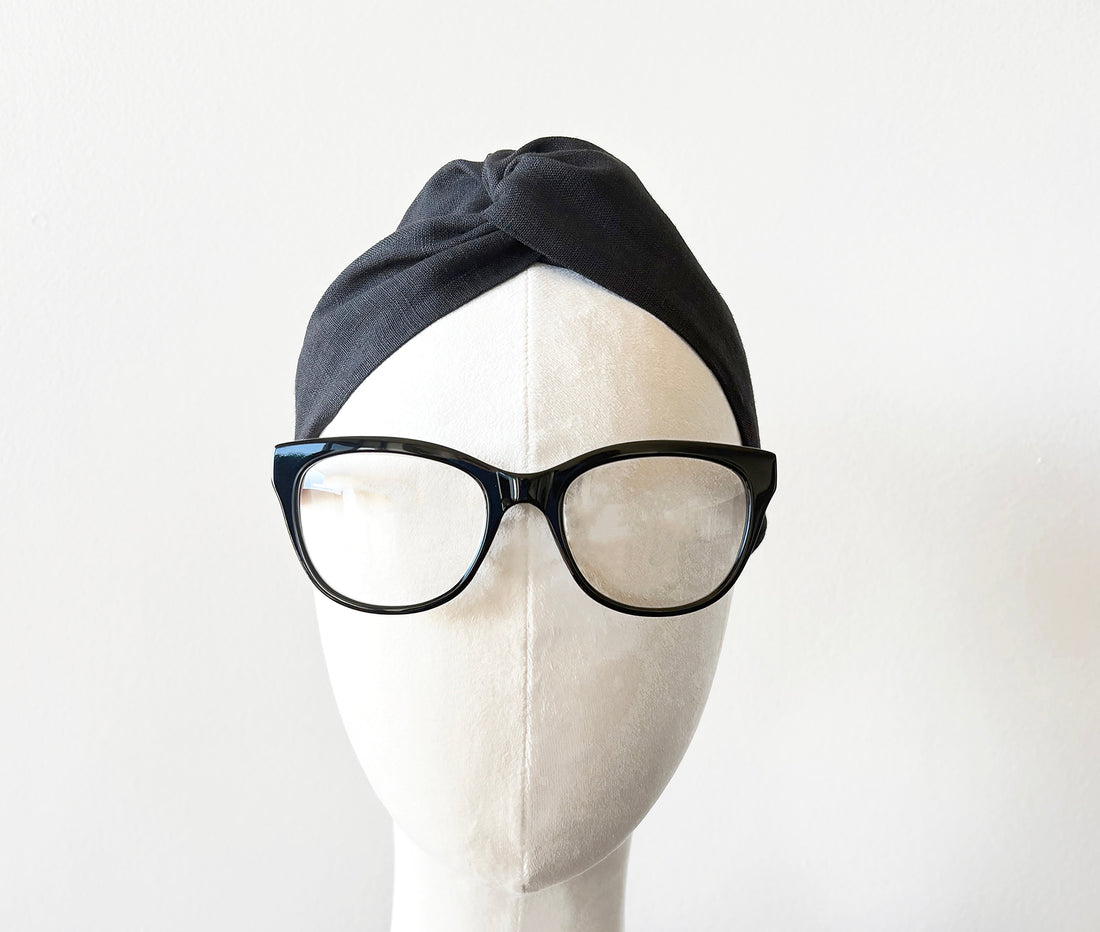 Handmade black linen turban headband with twist top knot and elastic fit