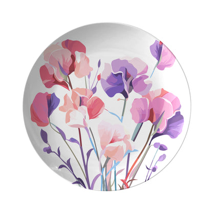 Round plate with April birthdays Sweet Pea floral design on a white background