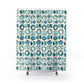 Shower curtain with aquamarine and gold crystal gemstones printed all over a white background.