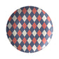 Round plate with a navy, red and cream diamond argyle pattern.