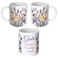 three white mugs showing all sides of printed floral designs and personalized text on a white background