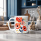 White mug with floral design on a kitchen counter