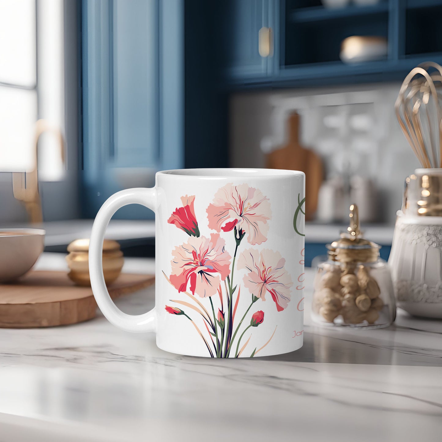 White mug with floral design on a kitchen counter