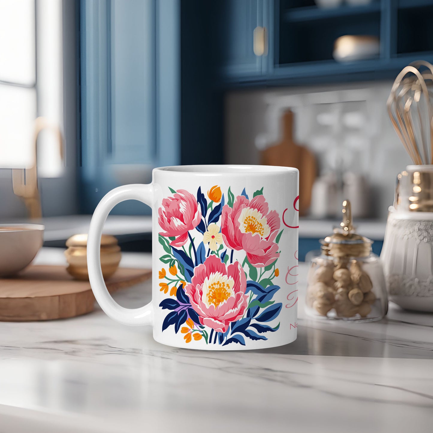 White mug with peony birth month floral design on a kitchen counter