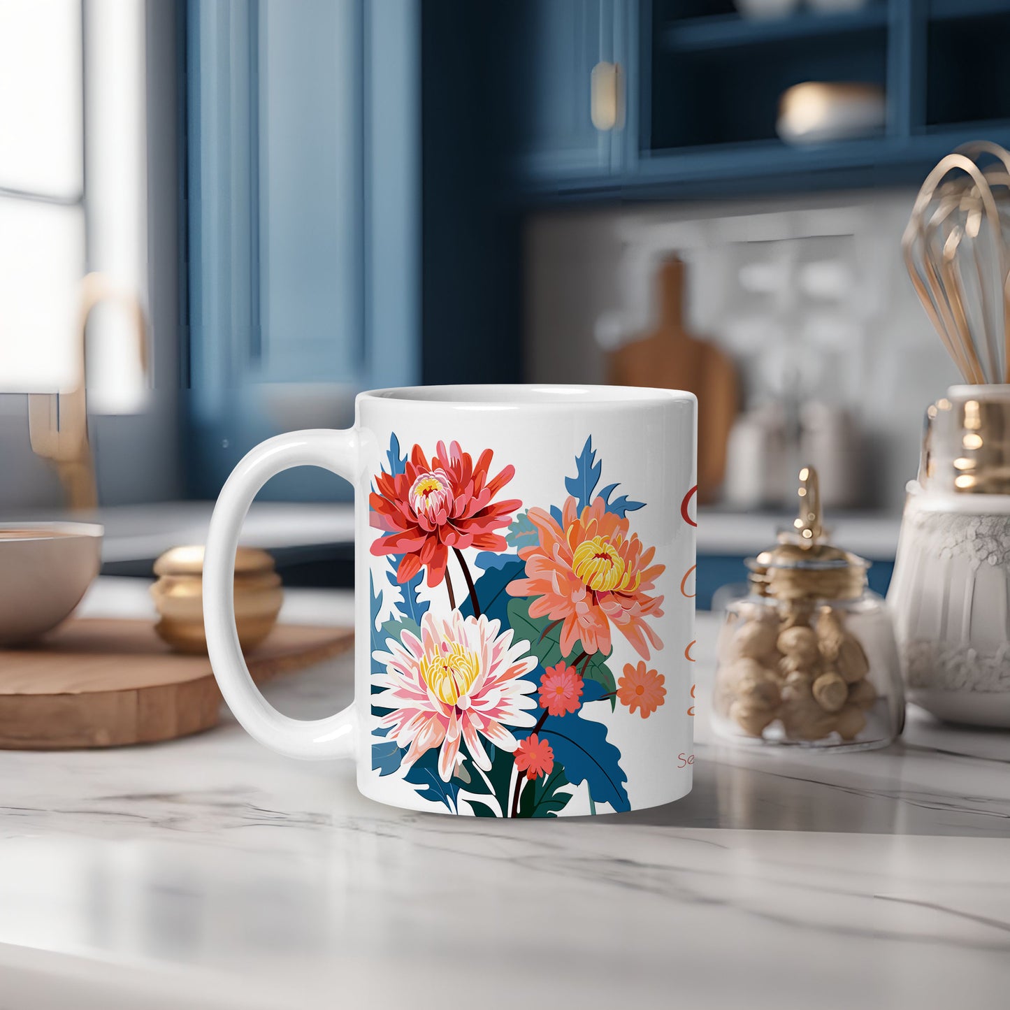 Floral mug on a kitchen counter with blue cabinets and kitchen utensils in the background