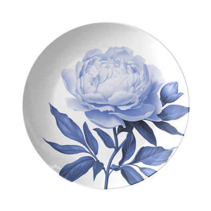 Dinner plate with a blue floral design on a white background