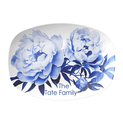 Blue peony print on white oval serving platter personalized with custom family name 