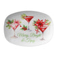 Decorative serving platter with Christmas-themed cocktails and 'Merry, Bright & Tipsy' text on a white background.