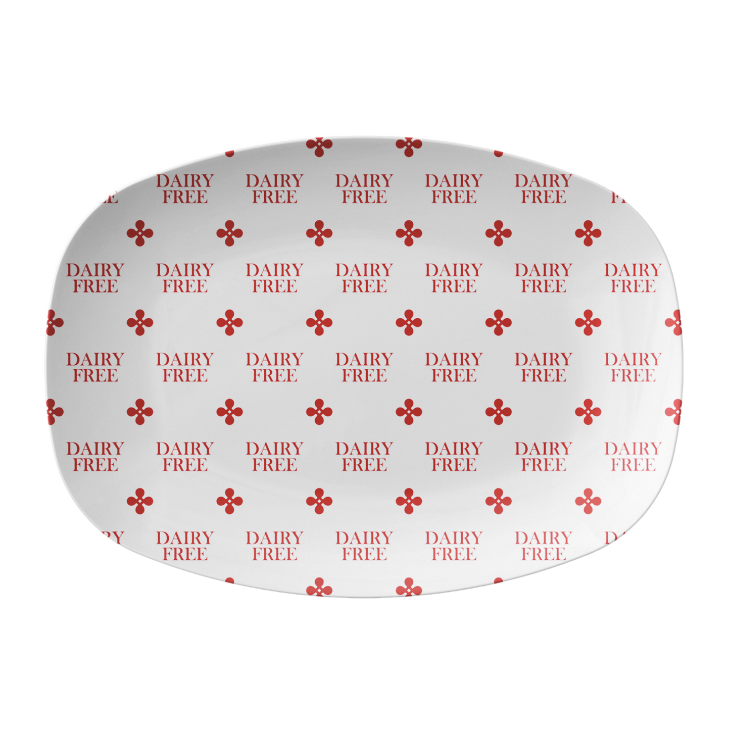 Round white label with 'DAIRY FREE' text and red clover motif on a white background