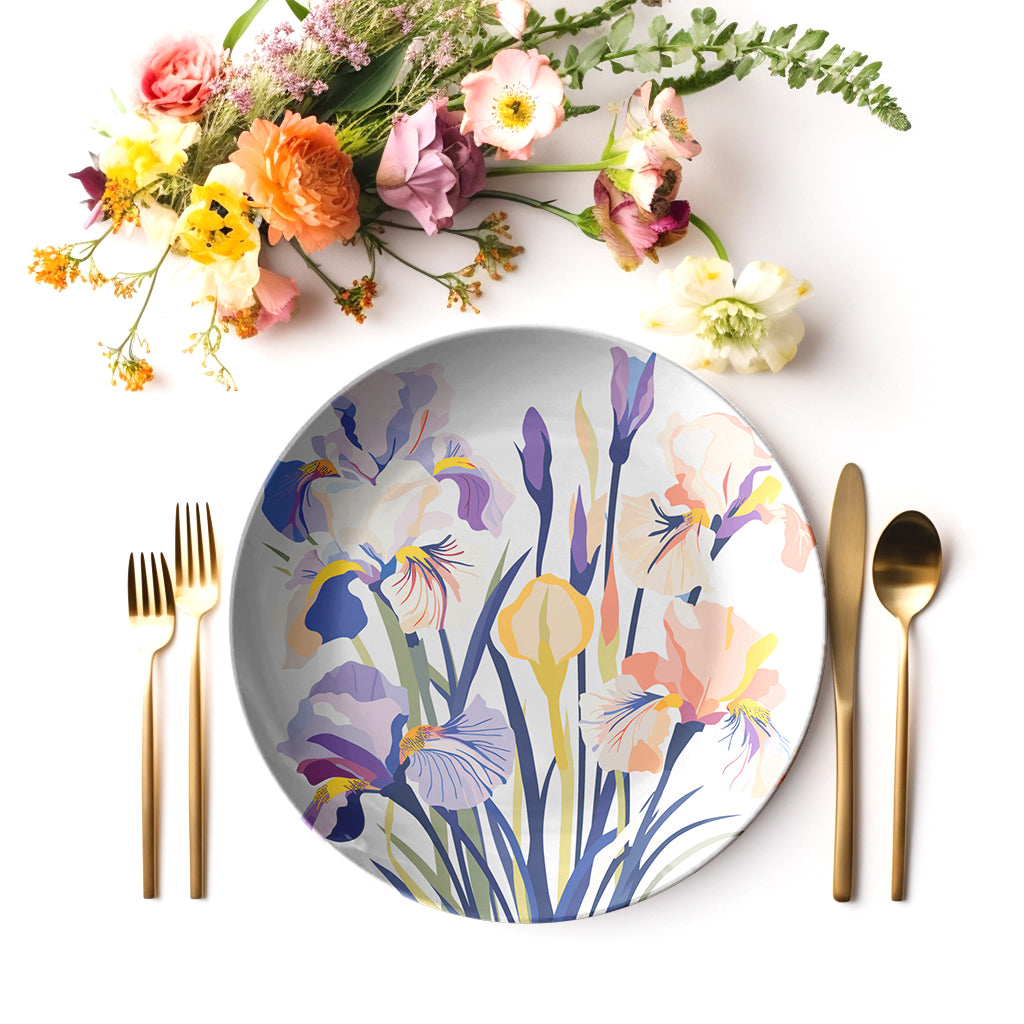 Iris Floral-patterned plate with cutlery and flowers on a white background