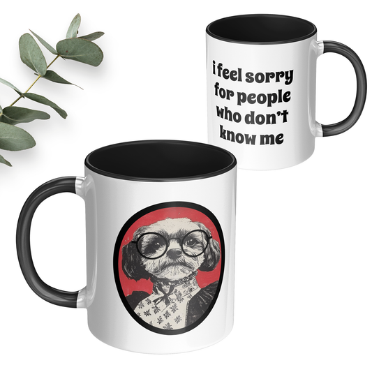 Funny coffee mug is white with a black handle and featues a cute dog with round wire glasses and on the back side says I feel sorry for people who don't know me.