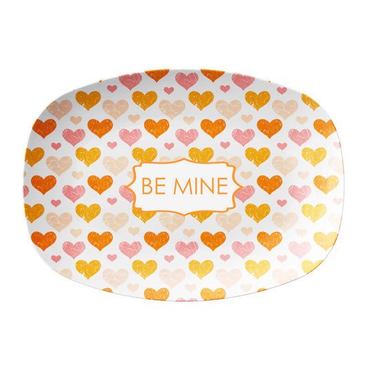 Oval-shaped serving dish with heart pattern and custom name or text on a white background