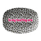 Leopard print oval serving platter with text that says in my hosting era in hot pink .