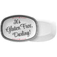 White serving platter has black and white label reading 'It's Gluten Free, Darling!' with a striped border on a white background.