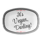 Oval serving platter labeled with 'It's Vegan, Darling!' black text and stripes on a white background