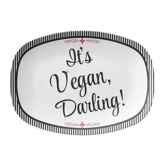 Oval serving platter labeled with 'It's Vegan, Darling!' black text and stripes on a white background